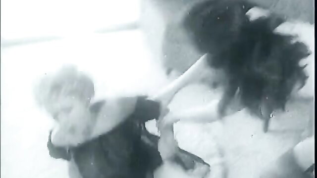 Vintage burlesque blonde wrestles in snow softcore action