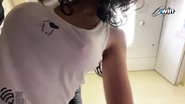 Curvy black babe in wet white tank top, nipples visible, teasing indoors