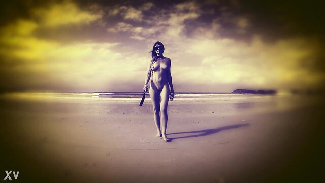 Missy Jubilee topless on beach holding dildo, trimmed pussy tease POV