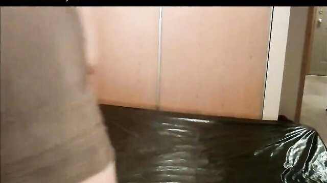 Lydias Gothic in kink device with tarp, bare ass exposed