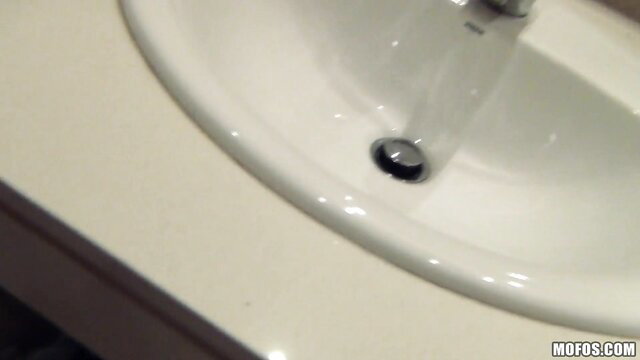 Veronica Vice in steamy shower sink tease closeup