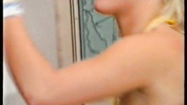 Vintage teen blonde in shower flexing arm, nude side view real amateur