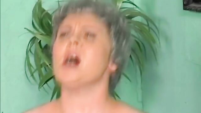Grey-haired mature slut rides fat cock with open mouth ecstasy