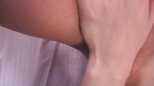 Hot Asian MILF arm fingered by horny younger man in bed