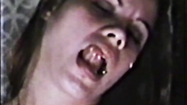 Retro porn closeup of ecstatic blonde woman screaming in pleasure