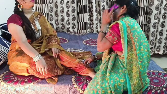 Desi Indian MILFs in sarees touching faces intimately on bed