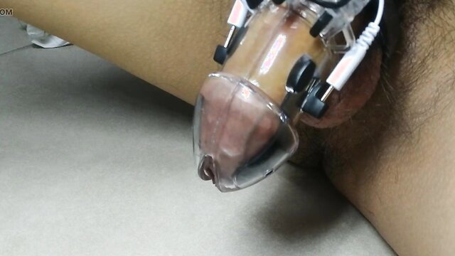Twink electro-shocks small caged dick in new toy BDSM play