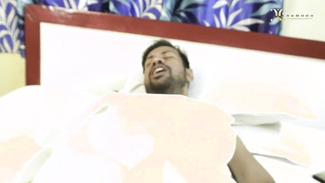 Dirty doctor in bed with patient, wide grin during steamy fuck