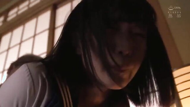 Japanese schoolgirl in uniform closeup, learning BDSM expression