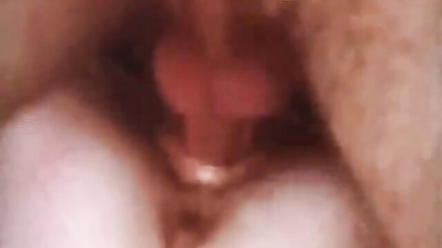 Retro porn closeup of big tanned babe's wet pussy with pink labia