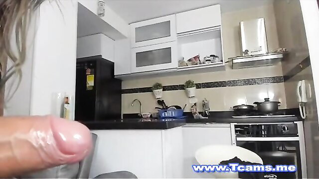 Shemale strokes huge dick in kitchen, massive tits POV