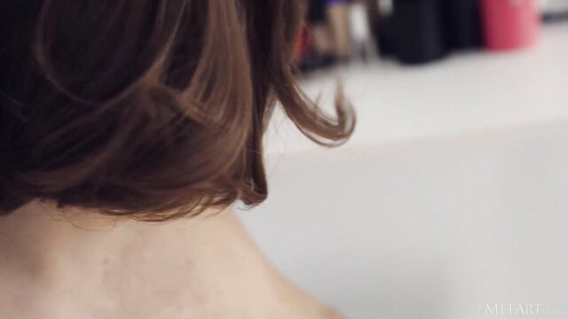 Hot model with bob haircut in steamy dressing room prep