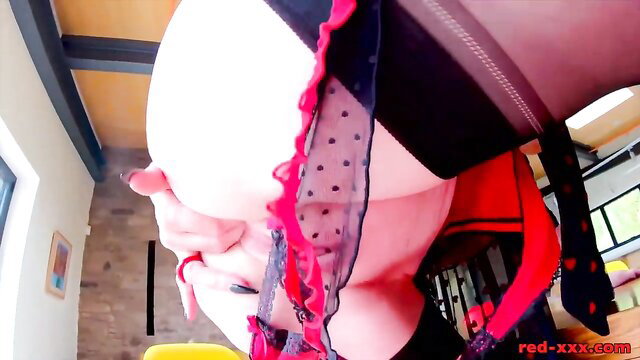 Hot MILF teases with massive natural tits in red lingerie, stockings, heels