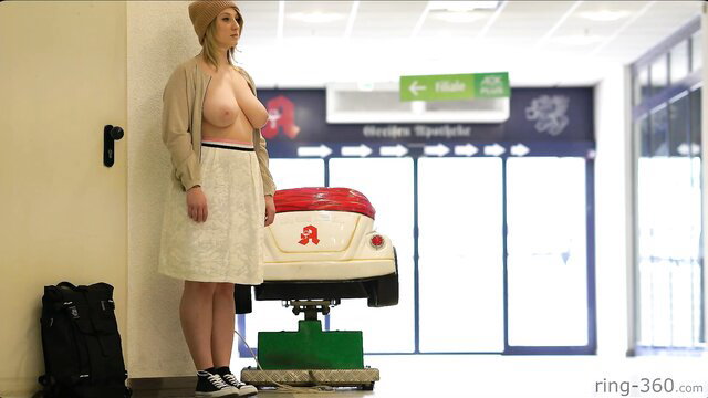 Busty blonde babe with massive tits flashes topless by VW Beetle ride