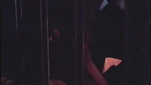 Vintage VCA porn: woman smoking behind bars, hairy cock tease