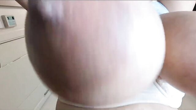 Big lactating tits of naughty Asian MILF bulging in white panties