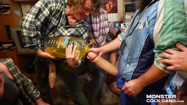 Nicole Love gangbang: guys pour oil on massive cock POV