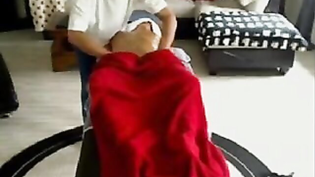 Man massaging nude Asian woman's bare ass in kinky parlor