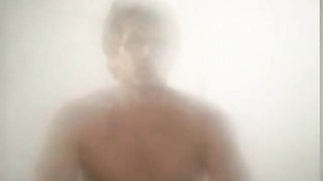 Blurry image of a shirtless man
