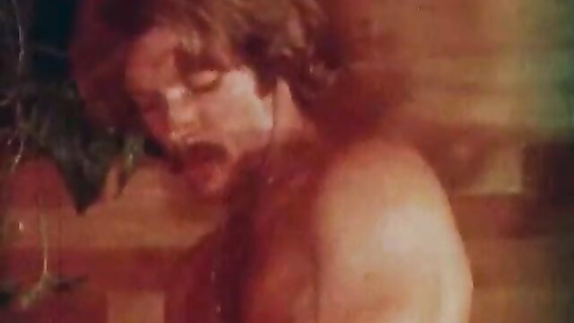 Hairy 70s stud with mustache in intense closeup from classic anal porn