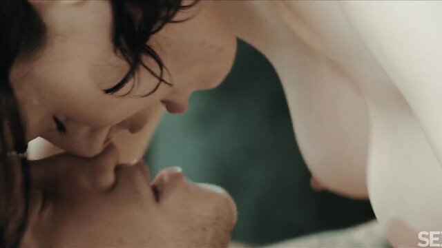 Olive Glass topless kissing lover passionately in steamy SexArt scene