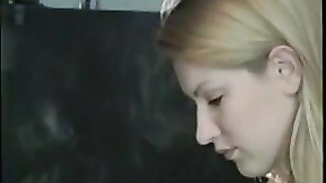 Hot blonde girlfriend smokes cigarette, stunning profile view