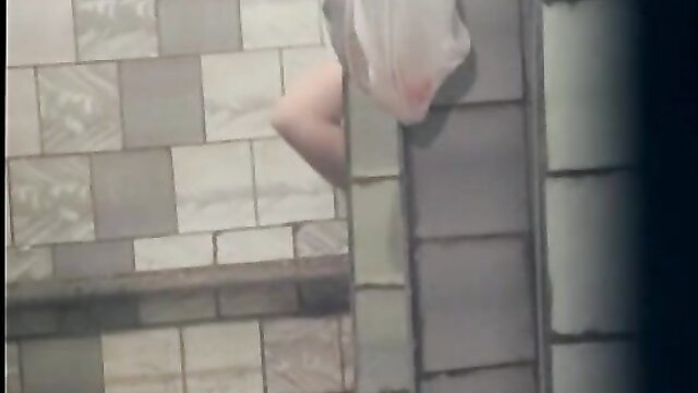 Chubby white babe showering naked caught on voyeur cam