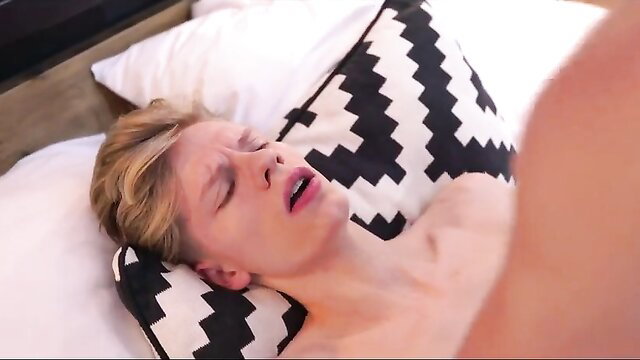 Blond twink boy moaning in ecstasy taking it up the ass on bed