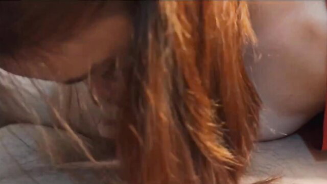 Redhead with huge tits bound in white bandages, face down ass up