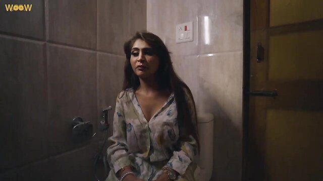 Indian MILF in sheer blouse sitting on toilet, kidnapped hot series
