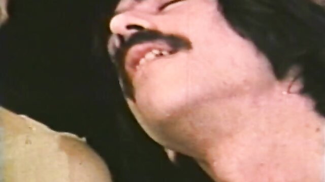 Vintage porn man with mustache in intense closeup ecstasy face
