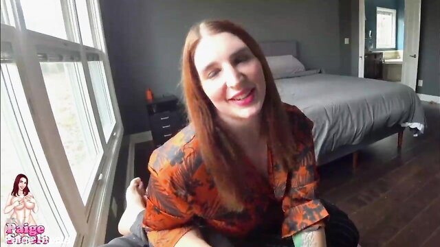 Paige Steele as mommy girlfriend in orange blouse, smiling invite