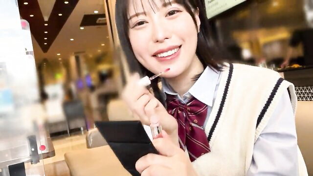 Japanese schoolgirl in uniform applying lip gloss, shaved slender J-cup tease
