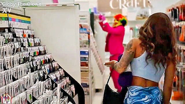 Mena Carlisle with Gibby The Clown in craft store aisle