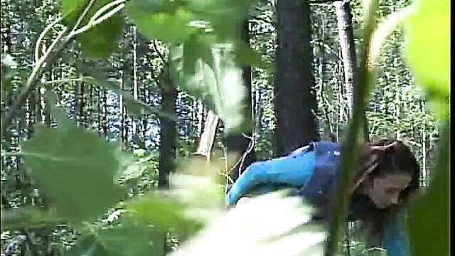 Stunning white girl squats to pee in forest, blue vest hike