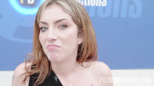 Isabella blonde model pouting closeup in PremiumBukkake BTS thumbnail