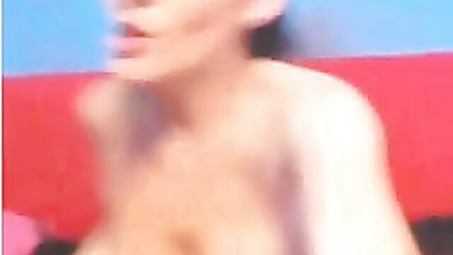 Blurry sexy webcam babe nude with tongue out in high heels