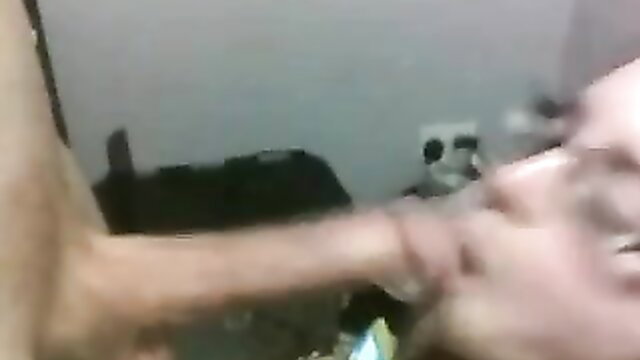 Nerdy glasses girl passionately sucking cock closeup