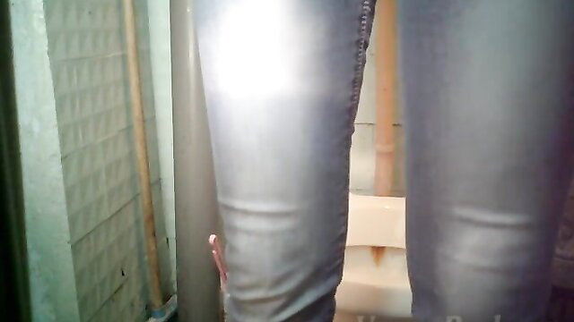 Pale chubby chick in tight jeans rides dildo in toilet