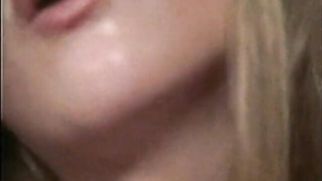 Closeup of blonde teen's plump lips, cheek and neck
