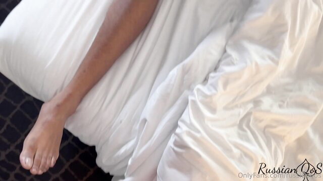 Black woman foot sticking out white sheets in bed cuckold creampie scene