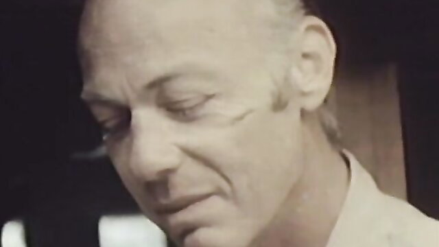 Bald man in retro China De Sade adult film thumbnail