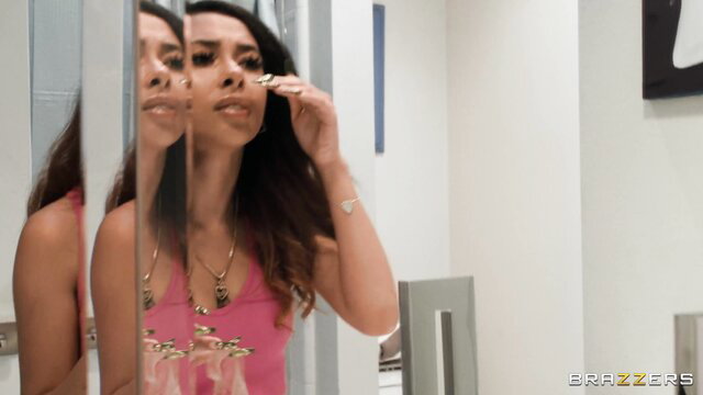 Asian beauty applying makeup in mirror, hot pink top, Brazzers