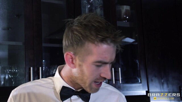 Danny D in tuxedo shirt bowtie, closeup face in Brazzers scene