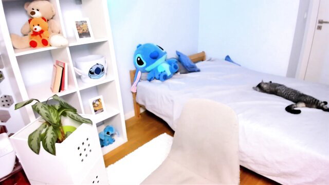 LaNuitTresor cozy bedroom cam with Stitch plush and cat