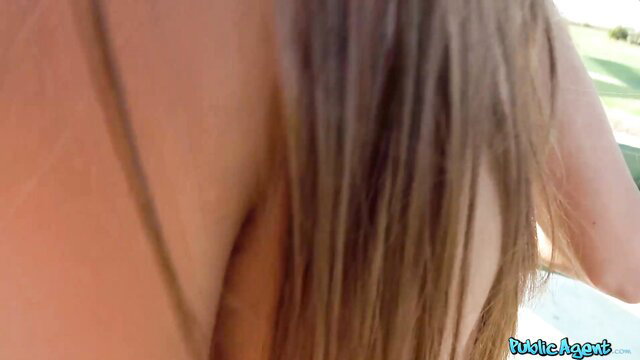 Cindy Shine closeup profile, long blonde hair, necklace, nude shoulder