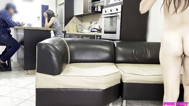 Nude Asian teen bends over sofa in kitchen, big ass tease