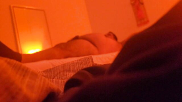 Nude man lying face down on massage table for happy ending