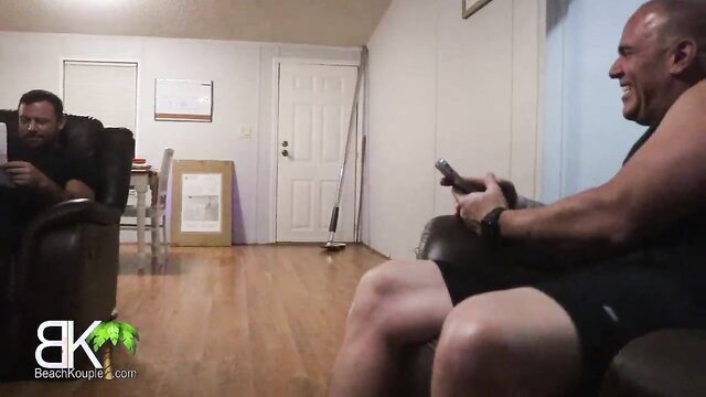 Scott Trainor laughs with buddy in living room, amateur gay thumbnail