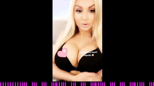 Blonde bimbo with huge tits in black bra, pink heart slip nipple tease